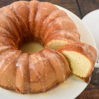 whipping cream pound cake wood background white plate