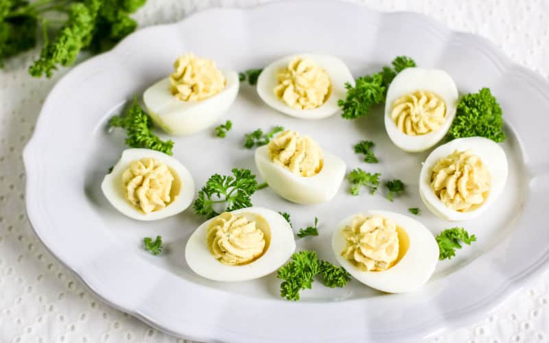 deviled eggs on plate without paprika or bacon