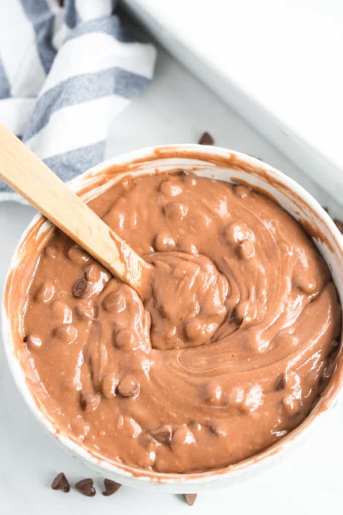 chocolate chip batter with wooden spoon