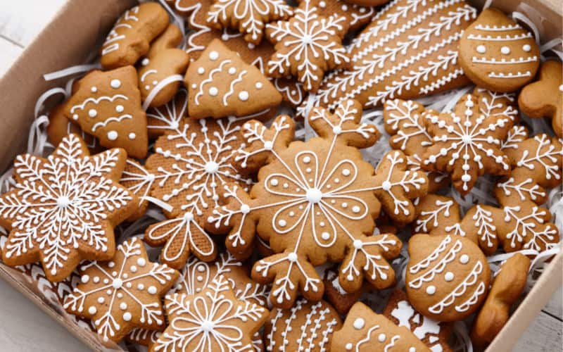 gingerbread lightly iced snowflake cookies in box