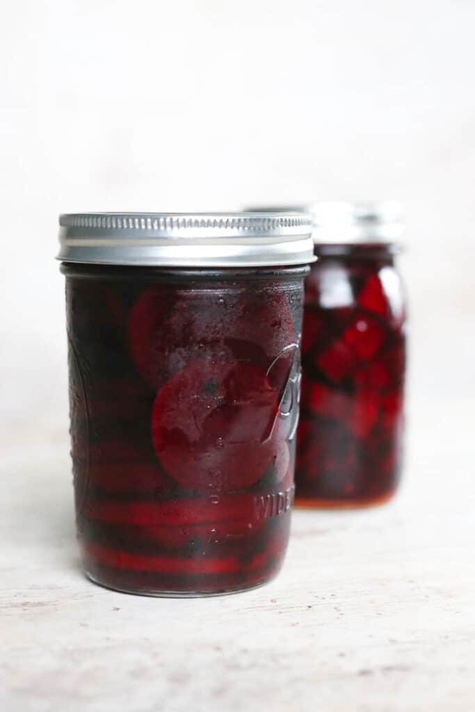 ball mason jars with quick pickled beets in them