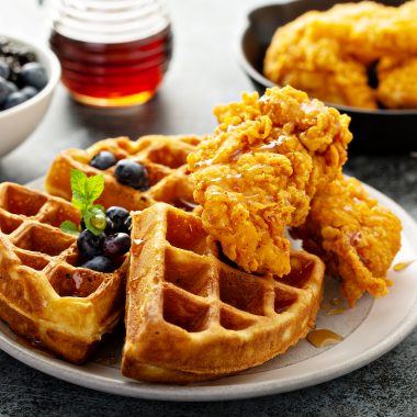 fried chicken and waffles with blueberries