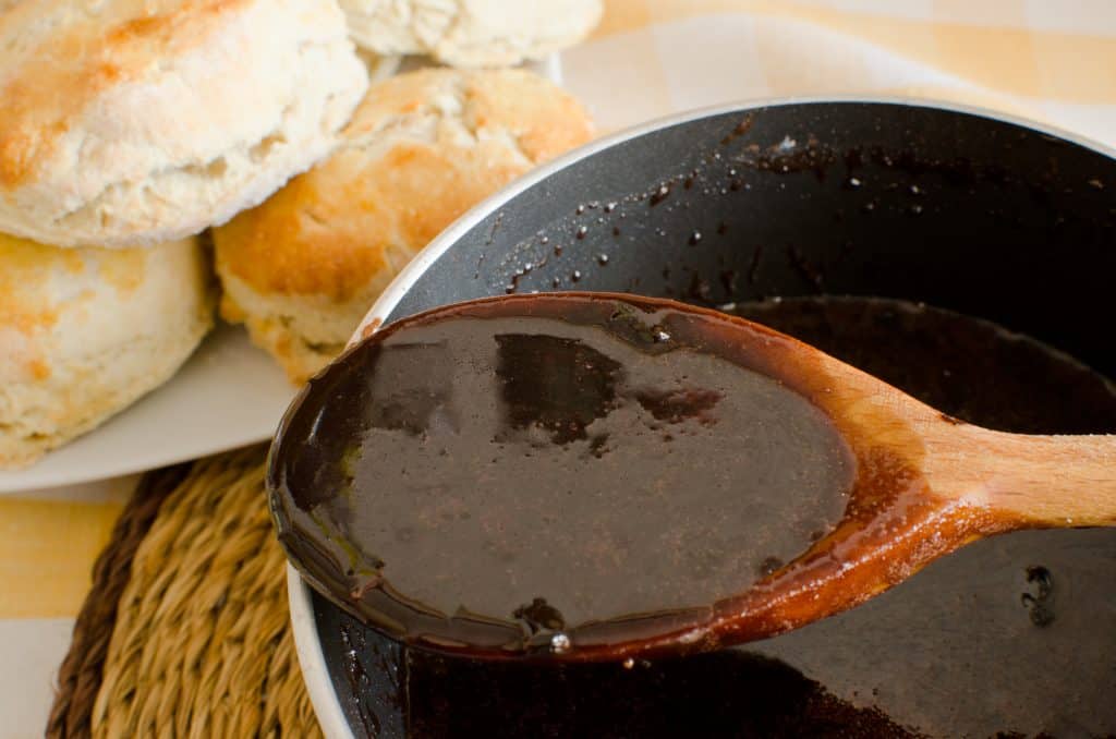 southern chocolate gravy on wooden spoon