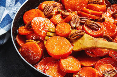 old fashioned candied sweet potatoes cooking in a skillet